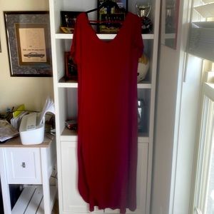 This dress has slits on both sides and pockets